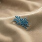 Épinglette rameau turquoise